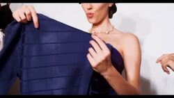 Three women choose what to wear Stock Footage