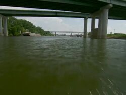 WS POV Boat passing below harnando de soto bridge / Memphis, Tennessee, United States Stock Footage