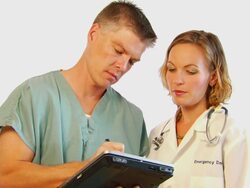 Medical Professionals use Tablet Computer Stock Footage