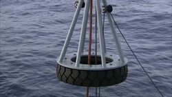 Pulleys hoist up a small submarine. Stock Footage