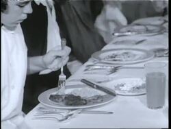 Olympic skater Cornelia Pooch Harrington and her family have dinner at their home. News Clip