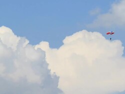 skydiving in blue sky with clouds. Stock Footage