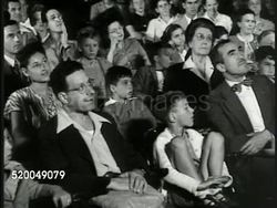 1946: NEW YORK CITY: * Curator Gordon Atwater (Chairman of Astronomy Department American Museum of Natural History) standing in planitarium theater before audience SOT explaining difference between astronomy & occult astrology. VS Audience, dark room. Instructional Video