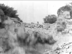 B/W 1934 gravel exploding on hillside in WPA sewage construction project / documentary Stock Footage