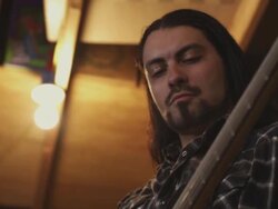 Handheld tilt A Latino bassist. Stock Footage