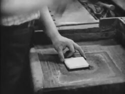 Manufacturing sheets of gold leaf Stock Footage