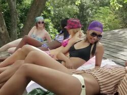 Women tanning on roof Stock Footage