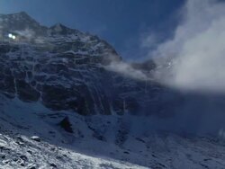 WS Clouds go from sun to shade with sunflare in upper left hand corner / Namche,Namche Valley,Nepal Stock Footage