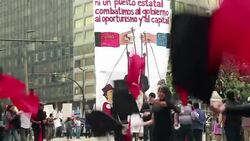 CLEAN : Pro and anti Correa protesters on Quito streets on May Day News Clip