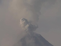 T/L video of ash exploding from the crater of volcano, Philippines, Dec 2009 Stock Footage