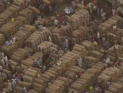 MS AERIAL DS ZO View dezoom large of  same coton market / Lagos, Nigeria Stock Footage