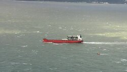 Aerials of stricken cargo ship in channel News Clip