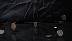 Super Slow-Motion: Coin Fall Stock Footage