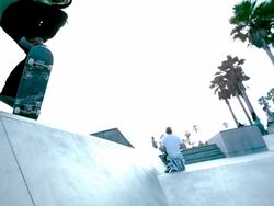 WS SLO MO LA Shot of Guy riding skateboard into air and falls / Venice, California, United States Stock Footage