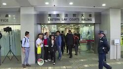 CLEAN : Hong Kong leader in court for glass throwing case News Clip