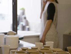 MS TU Shot of Potter woman is using smart phone in studio / Kyoto, Japan Stock Footage