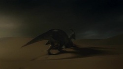 Surviving dinosaurs emerge from sand dunes after a sand storm in a computer generated animation. Stock Footage