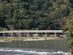 WS View of togetsukyo bridge in early fall / Arashiyama, Kyoto, Japan Stock Footage