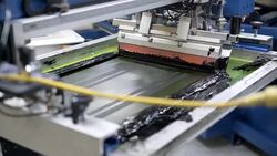 Printing machine at a clothing factory Stock Footage