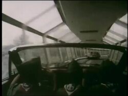 1964 time lapse over-the-shoulder car point of view boy scouts riding car amusement park ride at NY World's Fair Stock Footage
