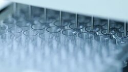 96 well plates on the Plate washer in laboratory Stock Footage