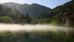 Wet fog moving over Seryangji lake(Reservoir in the Hwasun) Stock Footage