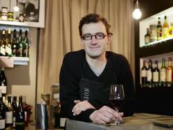 MS ZI Man standing near bar counter / Toulouse, Midi-Pyrennees, France Stock Footage