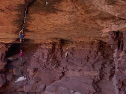 WS ZO View of male climber climbing crack upside down / Moab, Utah, United States Stock Footage