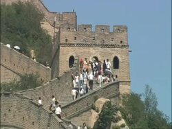 People walking along Great Wall of China, zoom out, Badaling, China Stock Footage
