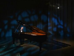 HD CRANE: Man Playing The Grand Piano Stock Footage