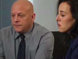 Male Doctor Gives Radiology Results to Couple - CU Stock Footage
