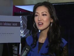 INTERVIEW: Kelly Choi describes the dishes at Korean New Year tables.  Stock Footage