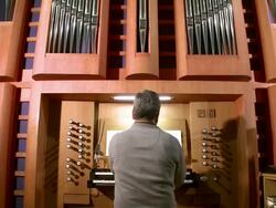 MS TU Organist at church organ playing / Saarburg, Rhineland-Palatinate, Germany Stock Footage