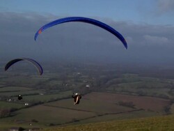 Paragliding on the South Downs, UK Stock Footage