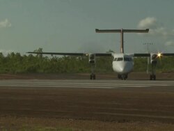 Australian Customs/Surveillance Dash 8 aircraft taxiing, Mungalalu, WA, Australia Stock Footage
