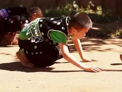 HD:Thai boy playing top. Stock Footage