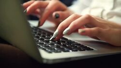 close-up  of womans fingers typing on keyboard Stock Footage
