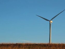 Wind turbine on prairie Stock Footage