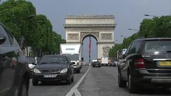 Vehicles Driving Along The Champs-Elysees News Clip