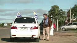 CLEAN : Suarez back in Uruguay thanks his supporters News Clip