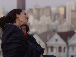 USA, California, San Francisco, Alamo Square Park, Woman with daughter (4-5) sitting in park Stock Footage
