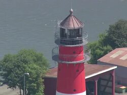  AERIAL MS DS View of lighthouse / Buesum, Schleswig-Holstein, Germany Stock Footage