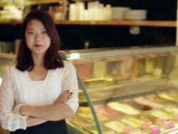 MS Young woman working in an ice cream shop. Stock Footage