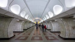 Commuters walk through a modern underground station in Prague, Czech Republic. Stock Footage