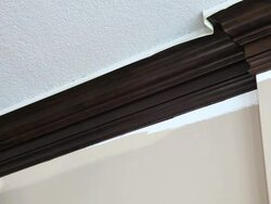 Painter Cutting in Wall to Crown Moulding Stock Footage