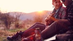 Cute couple have fun together on a hike picnic Stock Footage