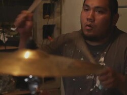 Handheld A Latino musician plays his drum set. Stock Footage