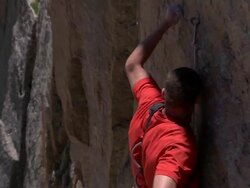 MS ZO ZI Shot of male climber climbing very difficult rock and falling with snow in backdrop / Estes Park, Colorado, United States Stock Footage