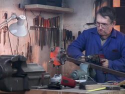 HD DOLLY: Toolmaker Drilling A Hole Stock Footage