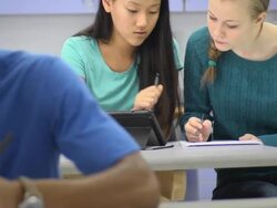 Female Students use Digital Tablet Computer Stock Footage